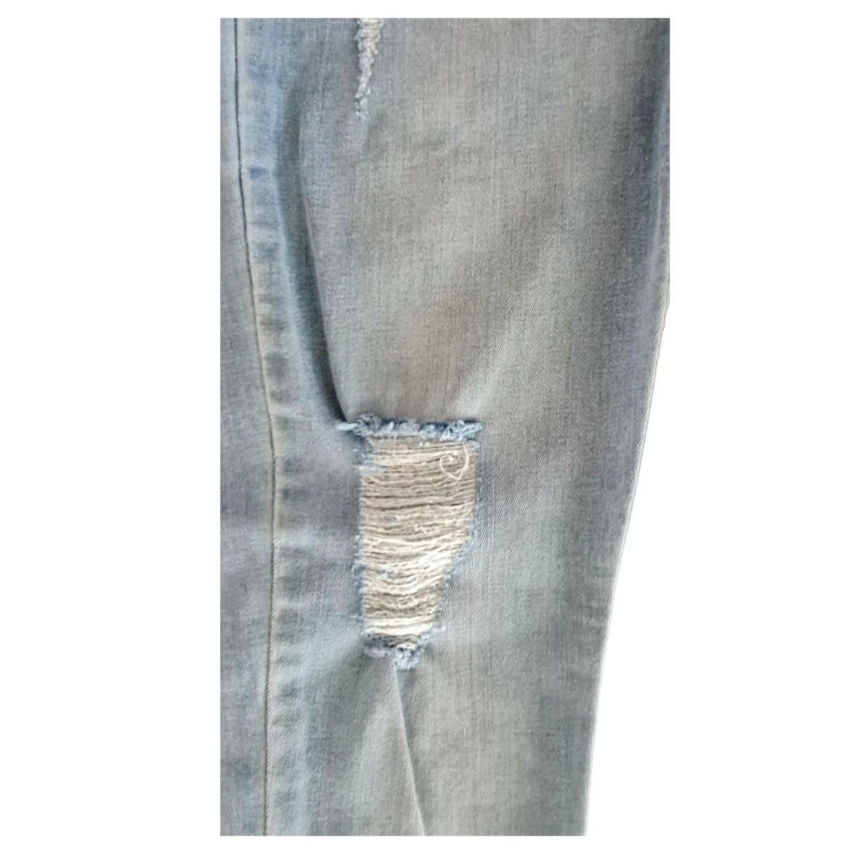 Skinny tiro alto con roturas grandes