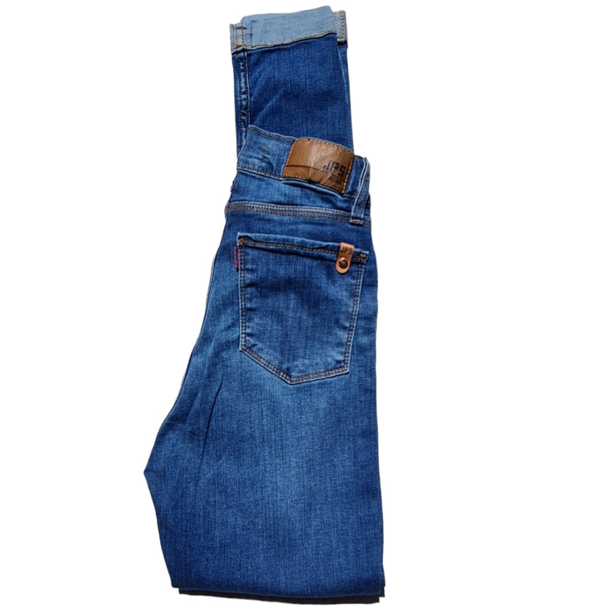 Skinny tiro alto con dobladillo y roturas