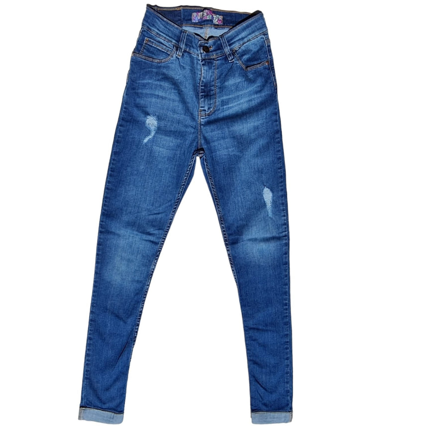 Skinny tiro alto con dobladillo y roturas