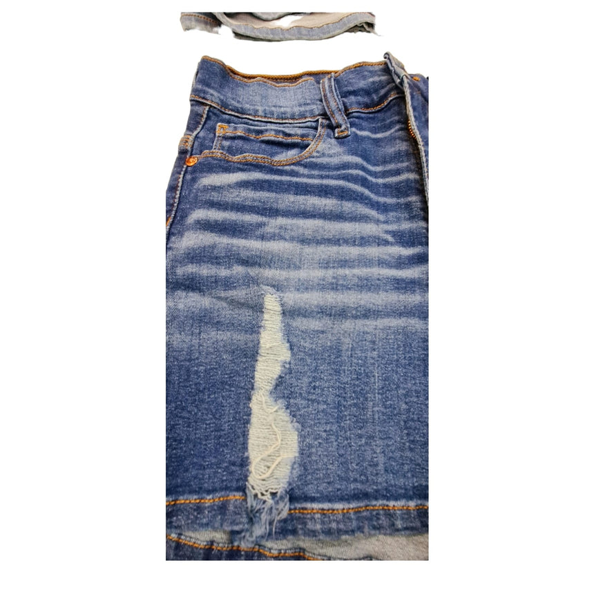 short de jean con bigotes y roturas